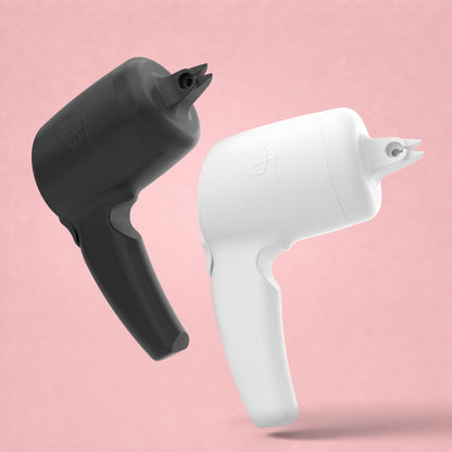 Black and white Velion Hair Highlight Gun professional hair lightener applicators on a pink background